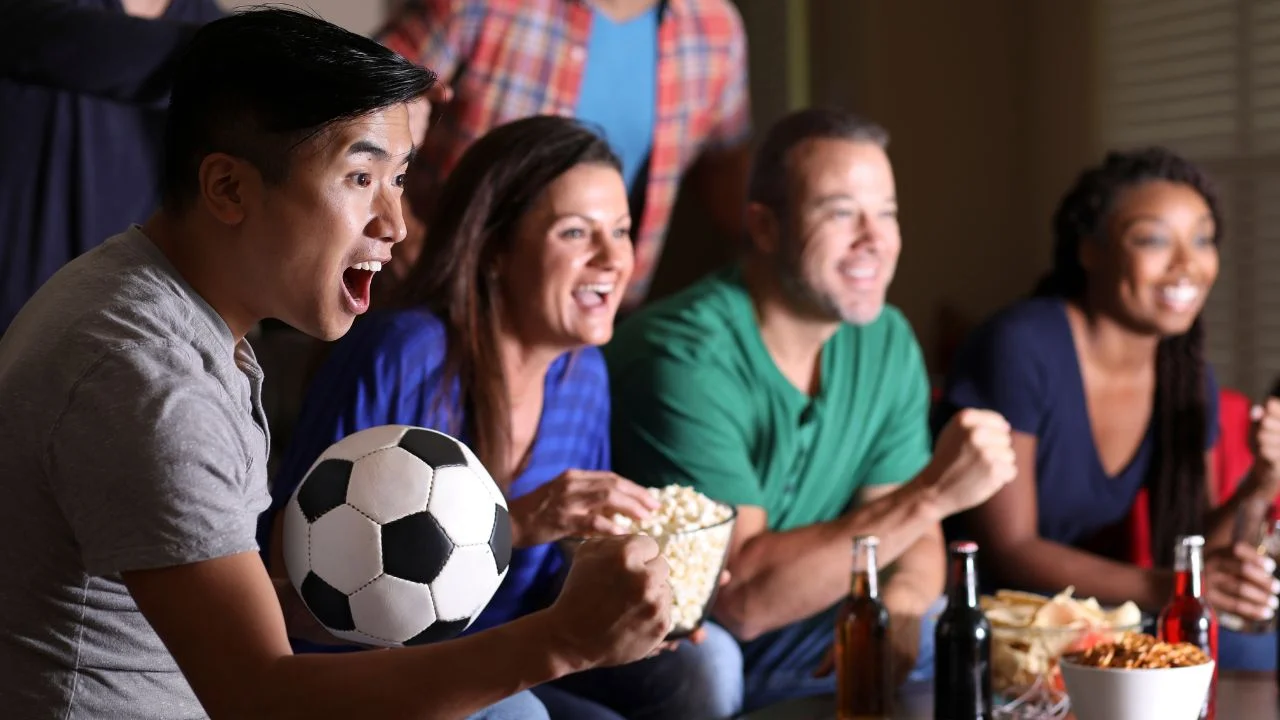 Sports Fans Celebrate Historic Football Victory